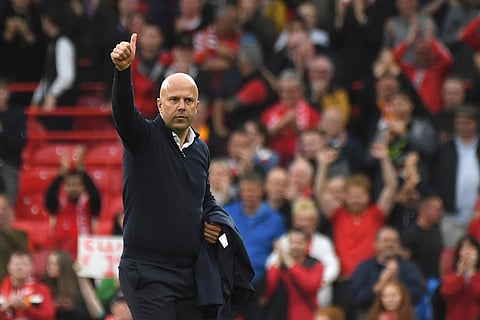 Premier League 2024-25: Liverpool's manager Arne Slot walks on the pitch at the end of against Brentford